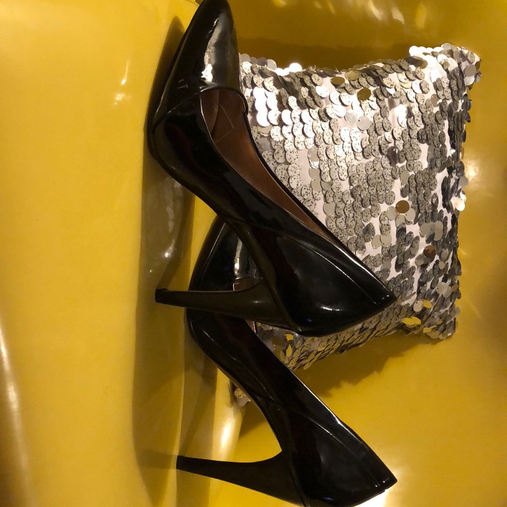 Black patent leather Jessica Simpson pumps.
